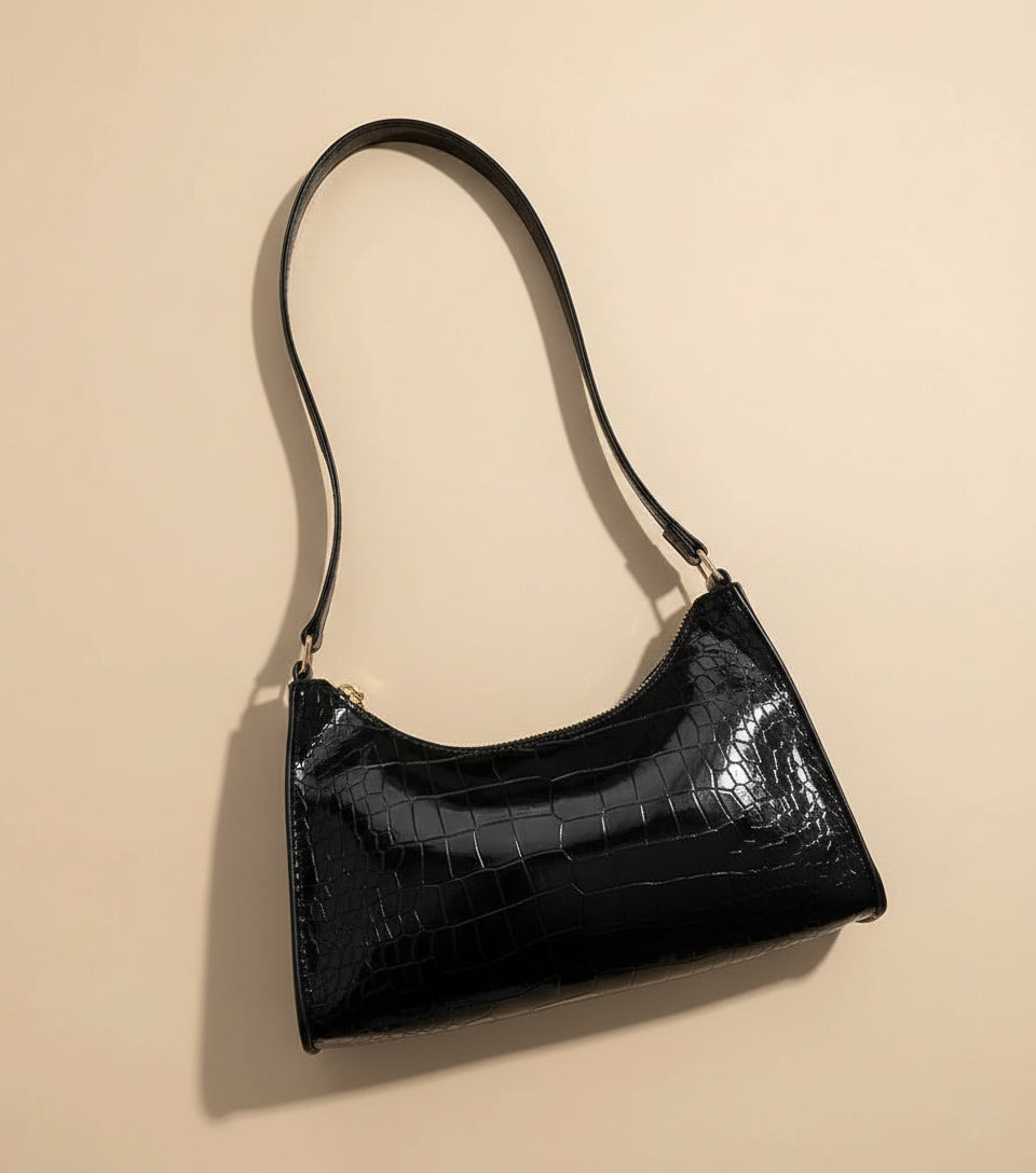 Western style black croc embossed shoulder bag for women by Pinkish